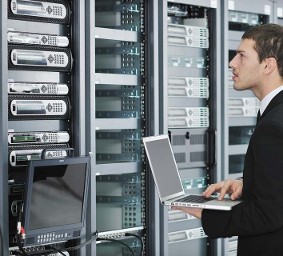 Man Looking at Network Systems - Computer Programming